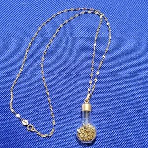 14k gold chain &a flat bottle w 14k bezel